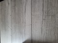 OUTLIV. Stół rozkładany Calvia 200/260 × 100 cm – aluminium / ceramika, antracyt / szary (imitacja drewna)
