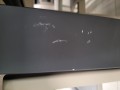 OUTLIV. Stół rozkładany Calvia 200/260 × 100 cm – aluminium / ceramika, antracyt / szary (imitacja drewna)