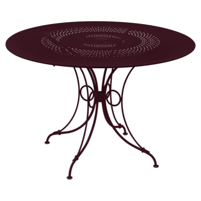 Fermob 1900 stół ogrodowy stalowy Ø117 cm okrągły, elegancki stół metalowy na taras, czarna wiśnia